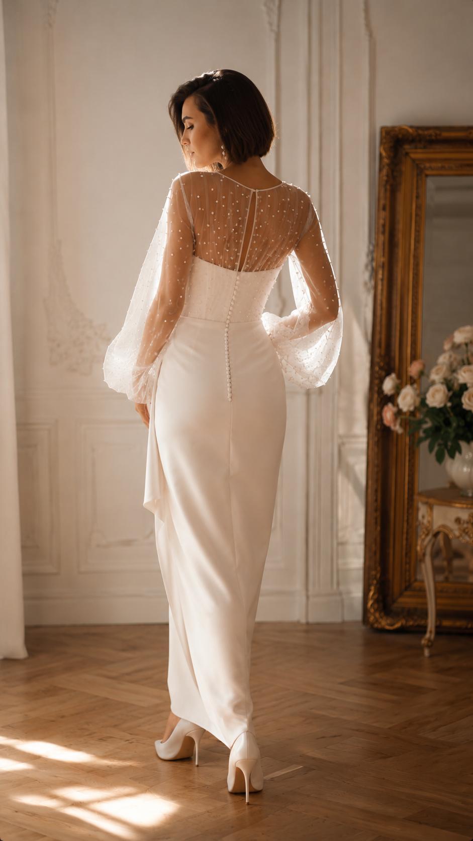 Весільна сукня Pearl Elegance з корсетом, перлинною сіткою та довгими прозорими рукавами